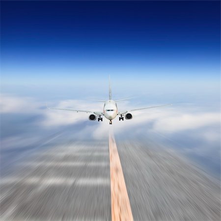 the airplane on  the blue sky background. Stock Photo - Budget Royalty-Free & Subscription, Code: 400-04274251