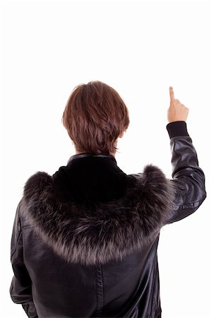 simsearch:400-04875087,k - Portrait of a young man from back with one finger  up, isolated on black. Studio shot Photographie de stock - Aubaine LD & Abonnement, Code: 400-04274554