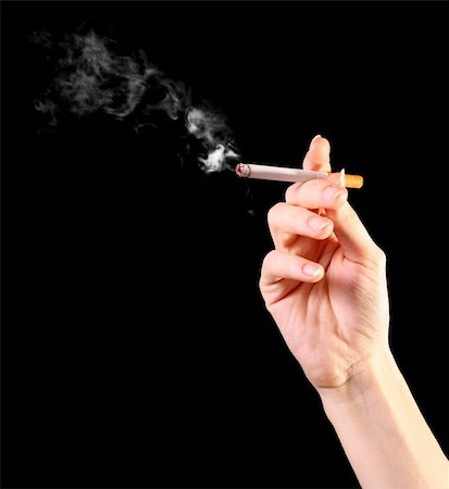 woman hand holding a cigarette with smoke Foto de stock - Super Valor sin royalties y Suscripción, Código: 400-04276895