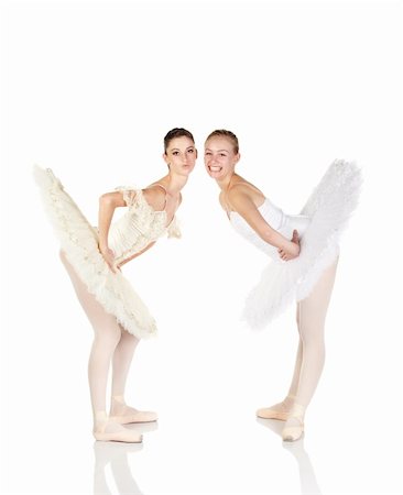 simsearch:400-04119672,k - Two Young caucasian ballerina girls on white background and reflective white floor showing various ballet steps and positions. Not Isolated Stock Photo - Budget Royalty-Free & Subscription, Code: 400-04277903