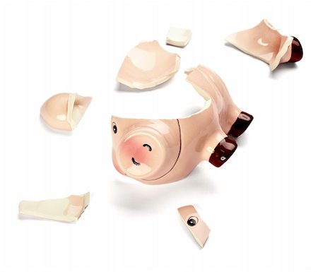 simsearch:400-06077471,k - close up of a broken piggy bank on white background with clipping path Stock Photo - Budget Royalty-Free & Subscription, Code: 400-04271114
