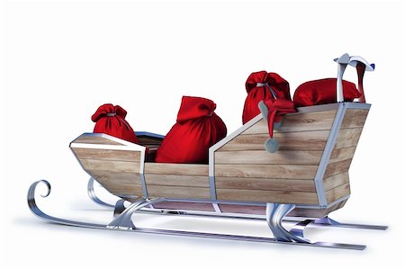 sleigh of Santa Claus with a bag of gifts. isolated on white including clipping path. Stock Photo - Budget Royalty-Free & Subscription, Code: 400-04273079