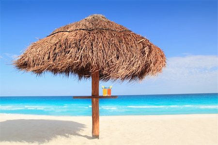 palapa sun roof beach umbrella in caribbean coast Stock Photo - Budget Royalty-Free & Subscription, Code: 400-04285435
