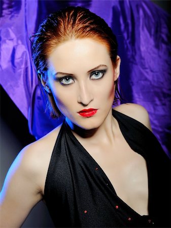 simsearch:400-04653285,k - Beautiful desperate woman with perfect bright make-up with red lips and dark shadowed eyes Photographie de stock - Aubaine LD & Abonnement, Code: 400-04287996