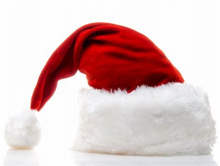 simsearch:400-08491819,k - Santa claus chapeau isolé sur blanc Photographie de stock - Aubaine LD & Abonnement, Code: 400-04288280