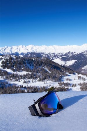 simsearch:400-05731177,k - Snowboard goggles on snow with high mountains panorama Stock Photo - Budget Royalty-Free & Subscription, Code: 400-04289177