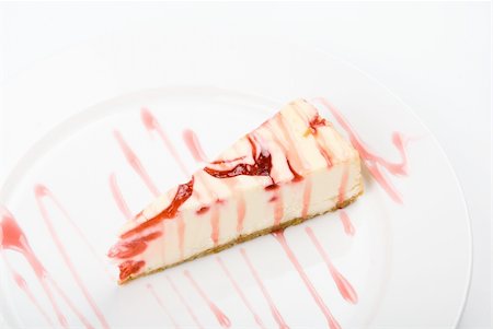 simsearch:400-05173009,k - Cheese cake at plate on a white background Stock Photo - Budget Royalty-Free & Subscription, Code: 400-04281848