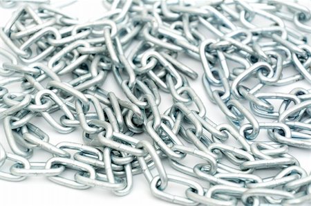 simsearch:400-07578126,k - metallic chain close-up isolated on white background Stock Photo - Budget Royalty-Free & Subscription, Code: 400-04282446