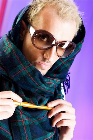 simsearch:400-04748544,k - Man with glasses in studio shooting Stock Photo - Budget Royalty-Free & Subscription, Code: 400-04283464