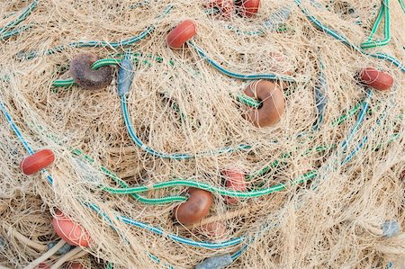 simsearch:6118-08910527,k - Colorful fishing nets piled up, a background Stock Photo - Budget Royalty-Free & Subscription, Code: 400-04283697