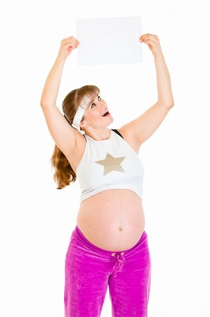 simsearch:400-04798379,k - Surprised beautiful pregnant woman holding empty white  paper over her head isolated on white Stock Photo - Budget Royalty-Free & Subscription, Code: 400-04294355