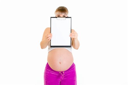 simsearch:400-04798379,k - Pregnant woman holding blank clipboard in front of her face isolated on white Stock Photo - Budget Royalty-Free & Subscription, Code: 400-04294356