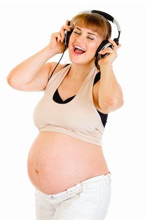 simsearch:400-04817039,k - Happy pregnant woman listening music in headphones  isolated on white Stock Photo - Budget Royalty-Free & Subscription, Code: 400-04294380