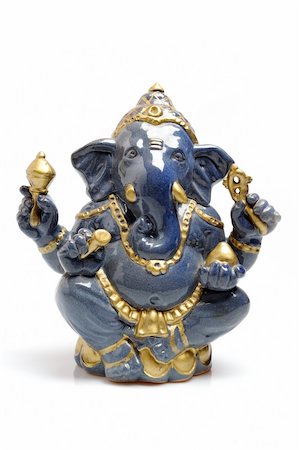 elephant god - A statue of an Indian god Lord Ganesha. isolated on white background. Stock Photo - Budget Royalty-Free & Subscription, Code: 400-04296061