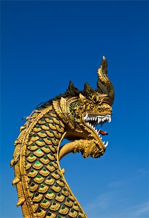Naga statue at Wat Pratat Doi Wow (Chiangrai, Thailand) Photographie de stock - Aubaine LD & Abonnement, Code: 400-04296186
