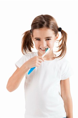 simsearch:400-04151137,k - Little girl brushing teeth isolated on white background Photographie de stock - Aubaine LD & Abonnement, Code: 400-04298066