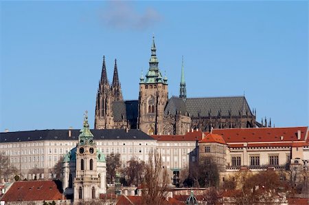 simsearch:400-04015133,k - Hradcany - Cathedral of Saint Vitus in the Prague castle - the coronation cathedral of the Bohemian sovereigns, and the main of the Prague Roman - Catholic arcidiocese. The Gothic buildings was founded in 1344. Prague castle - spacious residential and stronghold area dominantly located above the town, founded about the year 880. Residence of the Bohemian princes and kings, after 1918 of the Presid Stock Photo - Budget Royalty-Free & Subscription, Code: 400-04299333