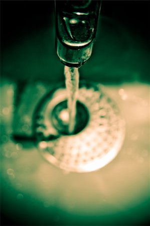 Water dripping from water tap , retro style toned photo with shallow DOF Stock Photo - Budget Royalty-Free & Subscription, Code: 400-04299626
