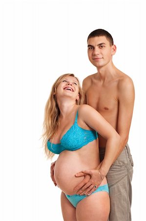 pregnancy nude - Pregnant woman with her husband just happy. Studio shoot on white. Stock Photo - Budget Royalty-Free & Subscription, Code: 400-04290041