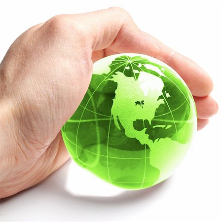 ecology concept with hand and glass globe isolated on white background Stock Photo - Budget Royalty-Free & Subscription, Code: 400-04290588