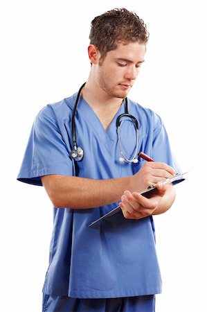 Stock image of male doctor writing on patient chart Stock Photo - Budget Royalty-Free & Subscription, Code: 400-04292384
