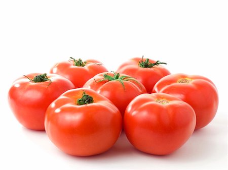 simsearch:400-04393672,k - Seven fresh tomatoes in a circle isolated on white background Stock Photo - Budget Royalty-Free & Subscription, Code: 400-04304862