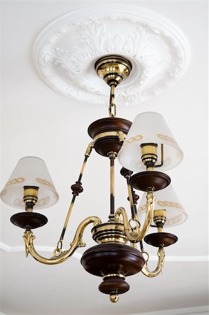 pictures of molding in house modern classic - beautiful bronze chandelier in a modern apartment Stock Photo - Budget Royalty-Free & Subscription, Code: 400-04305918