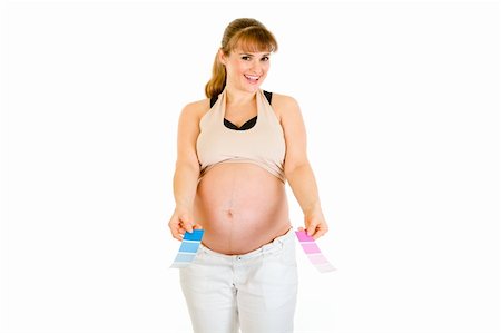 simsearch:400-04817039,k - Happy pregnant woman holding color paint samples isolated on white Stock Photo - Budget Royalty-Free & Subscription, Code: 400-04306020