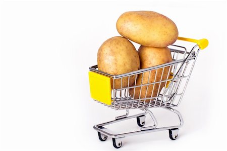 simsearch:400-04321973,k - Shopping cart with three large potatoes Stock Photo - Budget Royalty-Free & Subscription, Code: 400-04307581