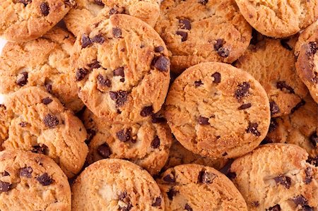 fat distress - Close up of delicious chocolate chip cookies background. Just out of the oven, freshly baked. Stock Photo - Budget Royalty-Free & Subscription, Code: 400-04308064