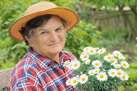 Senior woman gardening Stock Photo - Budget Royalty-Free & Subscription, Code: 400-04300212