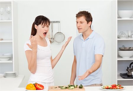 simsearch:400-05744780,k - Young lovers having dispute in the kitchen at home Stock Photo - Budget Royalty-Free & Subscription, Code: 400-04300869