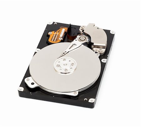 simsearch:400-05238336,k - Opened computer harddisk isolated on white background Stock Photo - Budget Royalty-Free & Subscription, Code: 400-04302389