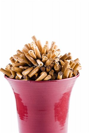 simsearch:400-05318197,k - Full bowl of cigarettes end over white background Foto de stock - Super Valor sin royalties y Suscripción, Código: 400-04302404