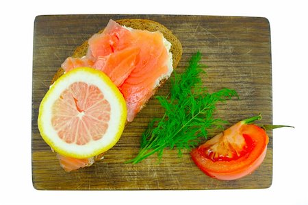 simsearch:400-05311244,k - smoked salmon, lemon and tomato on the board Foto de stock - Super Valor sin royalties y Suscripción, Código: 400-04302650