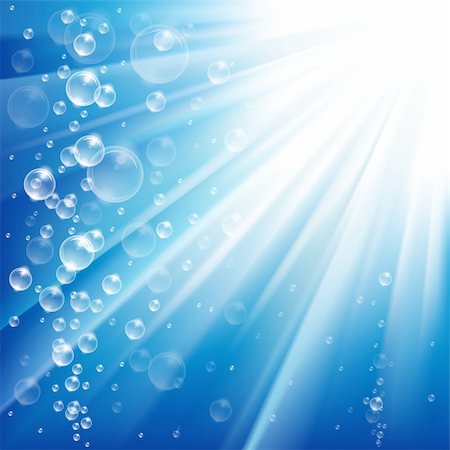 Blue ocean from underwater with bubbles with Light rays Stock Photo - Budget Royalty-Free & Subscription, Code: 400-04303235