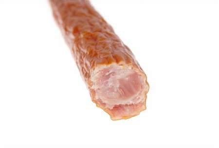 simsearch:400-04885499,k - Thin smoked pork sausages photo on the white background Stock Photo - Budget Royalty-Free & Subscription, Code: 400-04303355
