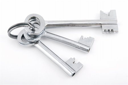 simsearch:600-03445182,k - silver bunch of keys on white background Stock Photo - Budget Royalty-Free & Subscription, Code: 400-04303589