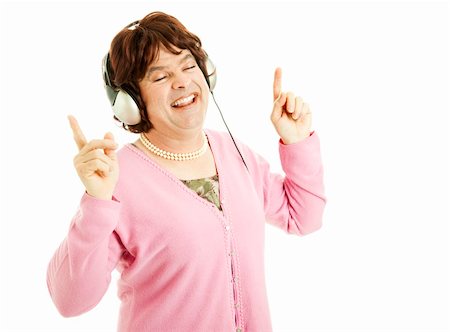 simsearch:841-06031350,k - Man dressed as woman, enjoying music with headphones on.  Isolated on white. Stock Photo - Budget Royalty-Free & Subscription, Code: 400-04314163