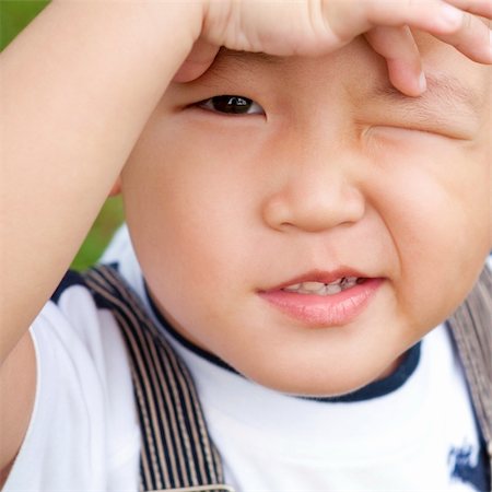 simsearch:400-05388090,k - Little Asian boy is confusing, close up face. Stock Photo - Budget Royalty-Free & Subscription, Code: 400-04315319