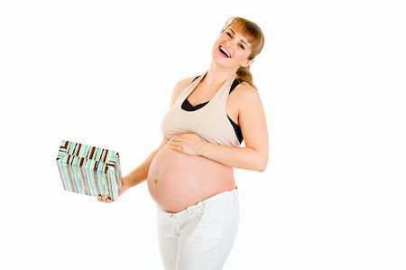 simsearch:400-04817039,k - Laughing pregnant woman holding gift for her baby  isolated on white Stock Photo - Budget Royalty-Free & Subscription, Code: 400-04315975