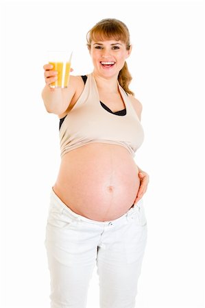 simsearch:400-04817039,k - Happy pregnant woman holding glass of juice in hand isolated on white Stock Photo - Budget Royalty-Free & Subscription, Code: 400-04315979