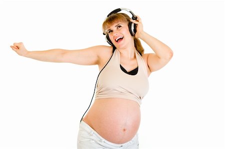 simsearch:400-04817039,k - Happy pregnant woman listening music in headphones  isolated on white Stock Photo - Budget Royalty-Free & Subscription, Code: 400-04315971