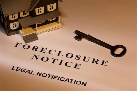 A key laying next to a house model and a foreclosure notice. Stock Photo - Budget Royalty-Free & Subscription, Code: 400-04319930