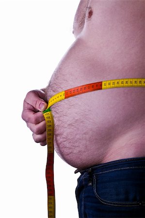 simsearch:400-06915547,k - fat man holding a measurement tape around his belly Foto de stock - Super Valor sin royalties y Suscripción, Código: 400-04310507