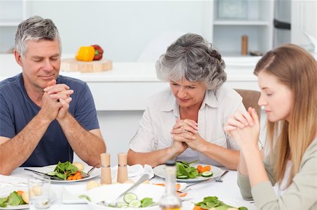 praying at table - Adorable family praying at the table Stock Photo - Budget Royalty-Free & Subscription, Code: 400-04311246