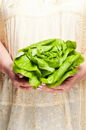 Housewife holding green salad Stock Photo - Budget Royalty-Free & Subscription, Code: 400-04312172