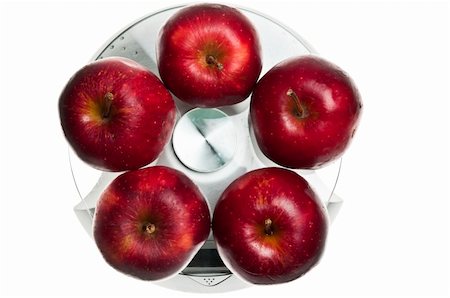 simsearch:400-04647880,k - Red apples isolated on food scale Stock Photo - Budget Royalty-Free & Subscription, Code: 400-04312187