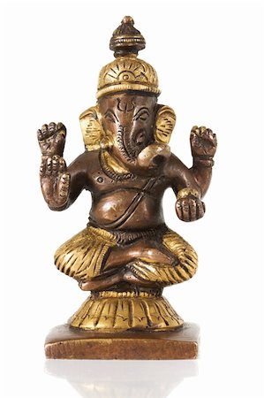 elephant god - Statuette of Ganesha isolated on a white background Stock Photo - Budget Royalty-Free & Subscription, Code: 400-04313416