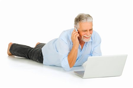 phone one person adult smile elderly - elderly man using laptop and mobile Stock Photo - Budget Royalty-Free & Subscription, Code: 400-04313747
